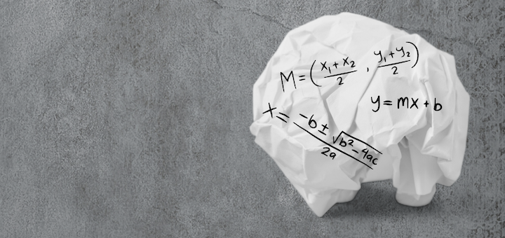 Crumbled white paper shaped like a brain on a grey concrete surface, with algebra formulas sketched on it (e.g., M =, y = mx + b).